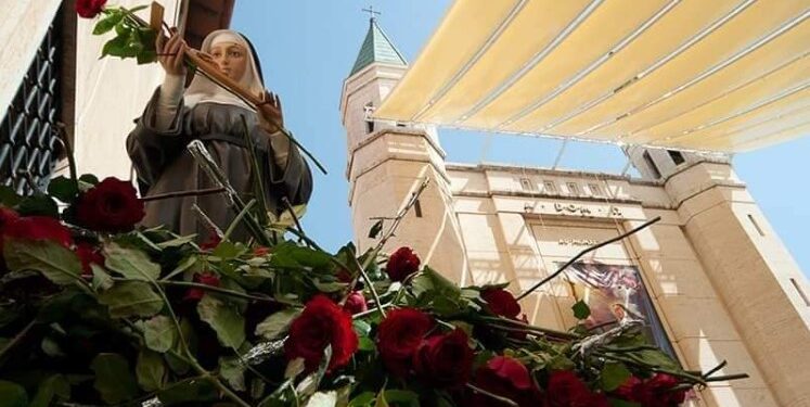 القديسة ريتا و أعجوبة الوردة والتين والعود اليابس الذي سقته يومياً